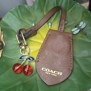 Coach Brown Leather Clochette, with Red Cherry Charm, EUC